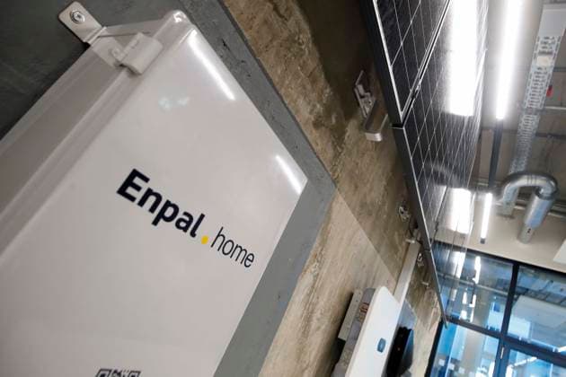 RegBm Franziska Giffey at Visit at Solar systems Start up Enpal in Berlin, the biggest Germans Solar Installation company for Roof systems, with Founder and CEO Mario Coal, before a Wall with Solarpanelen and Wallbox, Electric car Charging station, Berlin Germany, Germany