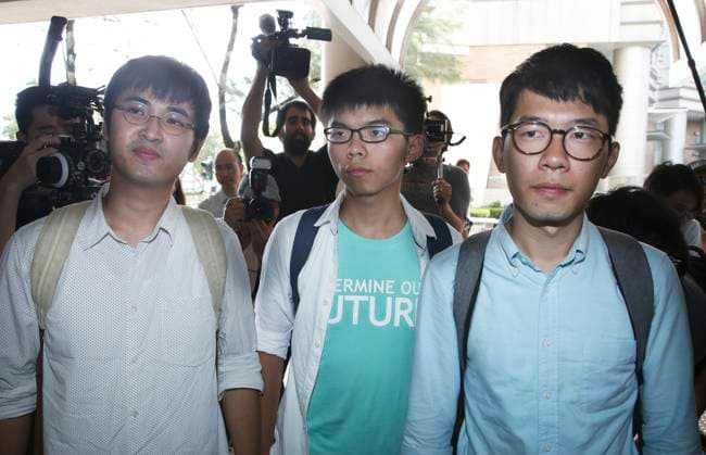 (L-R) Alex Chow Yong-kang, Joshua Wong Chi-fung and Nathan Law Kwun-chung arrive at Eastern Court to receive verdict for storming into citizen square. 21JUL16 SCMP Sam Tsang Hong Kong China EDITORIAL USE ONLY  Copyright: xx MER1607211527460250 SamxTsangx scmpphotos901911