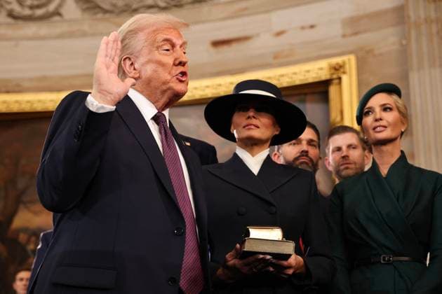 Trump and Vance Swearing-In at the US Capitol - DC President-elect Donald Trump takes the oath of office as Melania Trump, Ivanka Trump, Donald Trump Jr. and Eric Trump look on during inauguration ceremonies in the Rotunda of the U.S. Capitol on January 20, 2025 in Washington, DC. Donald Trump takes office for his second term as the 47th president of the United States. Photo by Chip Somodevilla Pool CNP ABACAPRESS.COM Washington DC United States  Copyright: xCNP ABACAx
