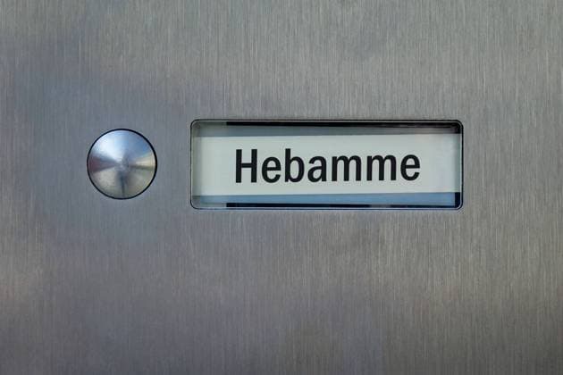 Doorbell sign with the lettering Hebamme Doorbell sign with the lettering Hebamme, 02 02 2025, Borkwalde, Brandenburg, In a doorbell sign is the lettering Hebamme