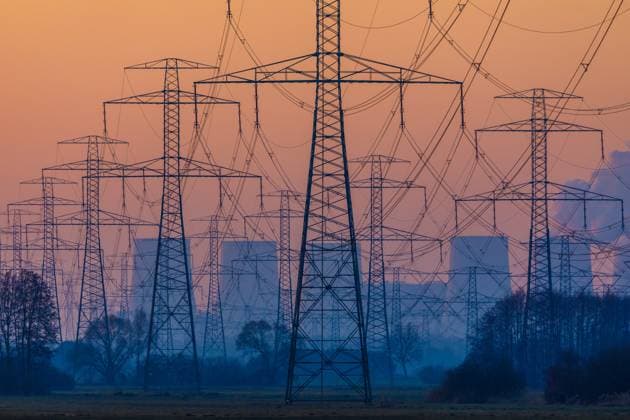 Jaenschwalde power plant DEU Germany Brandenburg Tauer, 11 02 2025, Lignite-fired power plant Jaenschwalde in the morning, the Jaenschwalde power plant and power line pylons can be seen on a frosty morning at sunrise near Tauer near Peitz in Lusatia AF_Tauer_2025_54457
