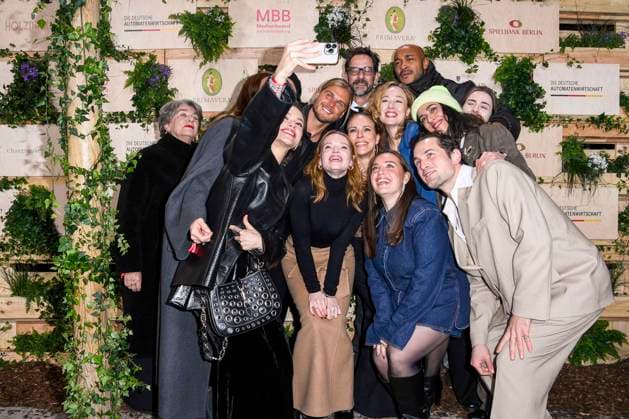 Emilia Schüle, Rurik Gislason, Karoline Herfurth, Dilara Aylin Ziem, Malick Bauer, Ilknur Boyraz and Samuel Schneider actress take cell phone photos as guests at the Medienboard Party at Holzmarkt in Berlin at the 75th Berlin International Film Festival on 15 02 2025 in Berlin Berlin Germany