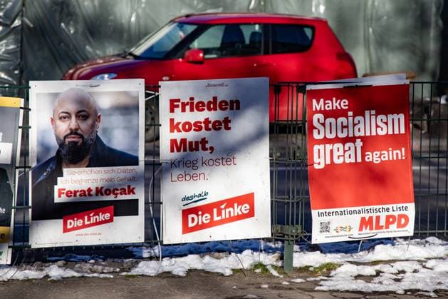Election posters of the Left Party with the direct candidate for Neukölln Ferat Kocak and the MLPD at Hermannplatz in Berlin on February 18, 2025 Bundestag election 2025