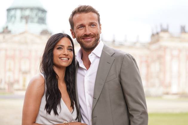 Amira Pocher%2C Christian Dueren at the Fashion Show from Marc Cain on 02 July 2024 vorm New Palais at Park Sanssouci in Potsdam Brandenbug Germany