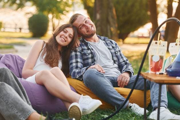 Happy couple. Group of young people have a party in the park at summer daytime., model released, , 51342462.jpg, group, people, hookah, sitting, relaxing, resting, smoking, culture, party, drink, cocktails, alcohol, beverage, armchair, bags, fun, together, outdoors, outside, summer, park, green, grass, caucasian, white, european, ethnicity, casual, clothes, wear, joy, cheerful, wellness, wellbeing, nice, positive, emotions, friends, weekend, leisure, free, time, sunlight, sunshine, beautiful, conversation, talking, communicating, socializing, young RECORD DATE NOT STATED