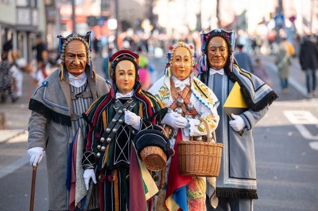 Fools pose in front of the camera during the Narrensprung in the city center The Rottweiler Narrensprung is one of the highlights of the Swabian-Alemannic carnival Rottweil Baden Württemberg Germany