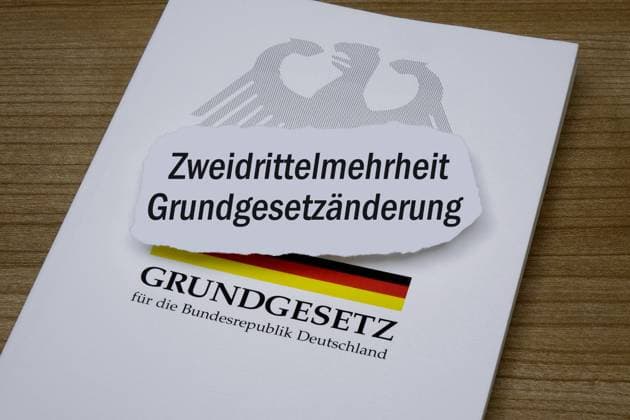 Basic law with basic law amendment and two-thirds majority Photomontage Basic law with basic law amendment and two-thirds majority, 06 03 2025, Borkwalde, Brandenburg, On a basic law is the lettering Basic law amendment and two-thirds majority