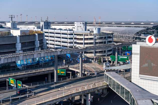 Düsseldorf Airport, terminal building, driveway, Skytrain for passenger transportation to parking garages and airport railway station, NRW, Germany, DUS Airport