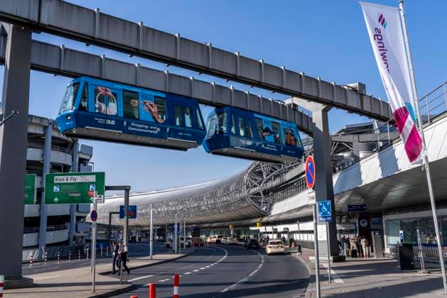 Düsseldorf Airport, terminal building, driveway, Skytrain for passenger transportation to parking lots and airport railway station, NRW, Germany, DUS, Airport DUS
