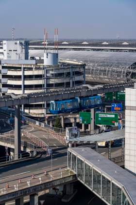 Düsseldorf Airport, terminal building, driveway, Skytrain for passenger transportation to parking garages and airport railway station, NRW, Germany, DUS Airport