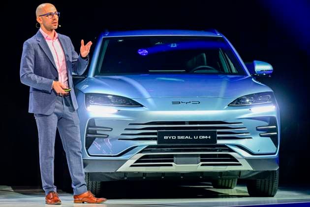 Launch of the new BYD (Build Your Dream) car brand in the Czech market, Forum Karlin, Prague, April 1st, 2025. The Chinese automotive giant plans to double sales abroad to more than 800,000 vehicles this year. On the photo is the BYD product manager for the Czech Republic and Slovakia David Vaculik at the Seal U DM-i hybrid model. (CTKxPhoto VitxSimanek) CTKPhotoP2025040104601  CTKPhotoP2025040104601