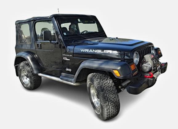 Schwarzer Jeep Wrangler tj 4x4 zeigt seine Off-Road-Fähigkeiten Black Jeep Wrangler tj 4x4 is parked and showing its off-road capabilities (License=RM) Copyright: xZoonar.com GamrothxJoergx 23288579