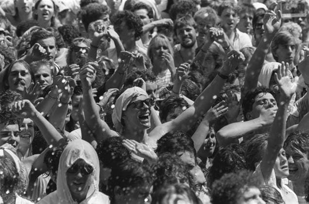 14.07.1985. A Times picture by Jeremy Nicholl show 14.07.1985. A Times picture by Jeremy Nicholl showing a generic view of the crowd in good spirits during the Live Aid concert at Wembley Stadium, North London. Neg no X2116D  Copyright: xJeremyxNichollx