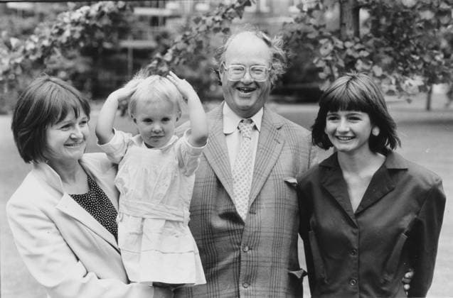 John Mortimer, author of Paradise Postponed is see John Mortimer, author of Paradise Postponed is seen her with his wife Penny, daughter Rosamund, aged two and daughter Emily aged 14 at a Thames TV Garden Party, 31.08.1986. Pic: Paul Lovelace, The Times.  Copyright: xPaulxLovelacex