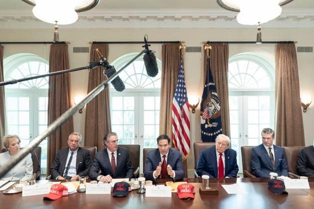 Secretary of State Marco Rubio speaks as President Donald Trump looks on during a cabinet meeting in the Cabinet Room of the White House in Washington, DC on Wednesday, April 30, 2025. WAP20250430532 KENxCEDENO