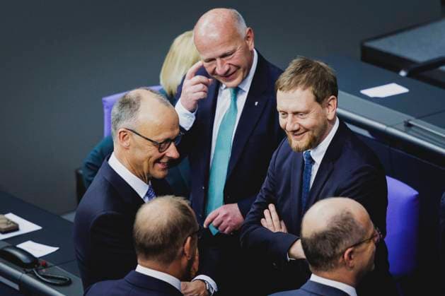 L R Friedrich Merz CDU , Chancellor-designate, Kai Wegner, CDU, Governing Mayor of Berlin, and Michael Kretschmer, State Premier of Saxony and CDU State Chairman, pictured during the Bundestag session for the election of the new Chancellor and the swearing-in of the federal ministers in Berlin, 06 05 2025 Berlin Germany Copyright: xFlorianxGaertnerx