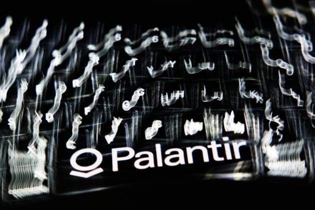 AI Brands Photo Illustrations A laptop keyboard and Palantir logo displayed on a phone screen are seen in this multiple exposure illustration photo taken in Krakow, Poland on May 6, 2025. Krakow Poland  Copyright: xJakubxPorzyckix originalFilename: porzycki-aibrands250506_npOnL.jpg