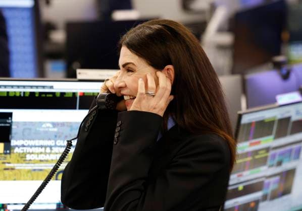 Actress Julianna Margulies speaks to a client at the 2025 BTIG Commissions for Charity Day in New York City on Tuesday, May 20, 2025.  NYP20250520104 JOHNxANGELILLO