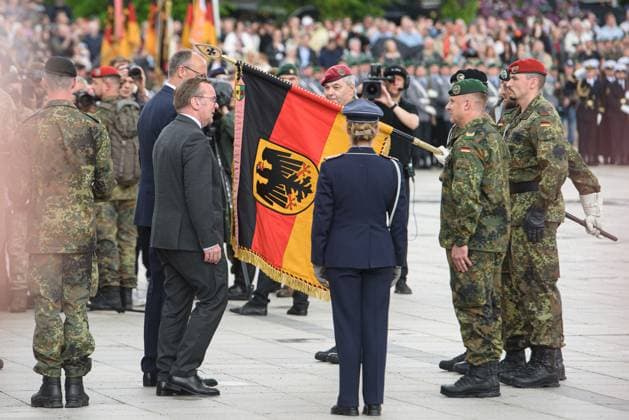 May 22, 2025, Vilnius, Lithuania: German Federal Chancellor Friedrich Merz and German Defence Minister Boris Pistorius participate in the inauguration of the German Brigade in Vilnius. The German 45th Armored Brigade Lithuania was officially inaugurated at a ceremony held at Cathedral Square in Vilnius, with the participation of German Federal Chancellor Friedrich Merz, German Defence Minister Boris Pistorius, Lithuanian President Gitanas Naus?da, and Lithuanian Defence Minister Dovil? Å akalien?..Established in Lithuania on 1 April 2025, the brigade is projected to comprise around 5,000 Bundeswehr soldiers and civilian staff, with full combat readiness expected by 2027. Vilnius Lithuania - ZUMAs197 20250522_aaa_s197_221 Copyright: xYauhenxYerchakx