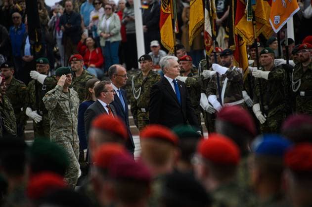 May 22, 2025, Vilnius, Lithuania: (L-R) German Defence Minister Boris Pistorius, Lithuanian Defence Minister Dovile Sakaliene, German Chancellor Friedrich Merz and Lithuanian President Gitanas Nauseda inspect the troops during the ceremony of the German brigade inauguration in Vilnius The German 45th Armored Brigade Lithuania was officially inaugurated at a ceremony held at Cathedral Square in Vilnius, with the participation of German Federal Chancellor Friedrich Merz, German Defence Minister Boris Pistorius, Lithuanian President Gitanas Naus?da, and Lithuanian Defence Minister Dovil? Å akalien?..Established in Lithuania on 1 April 2025, the brigade is projected to comprise around 5,000 Bundeswehr soldiers and civilian staff, with full - ZUMAs197 20250522_aaa_s197_231 Copyright: xYauhenxYerchakx
