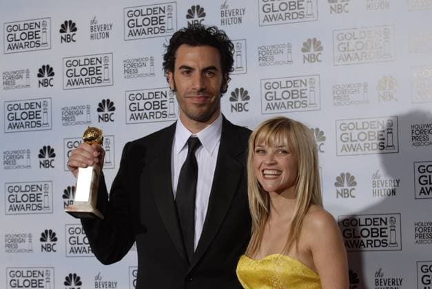 Pressroom - 64th Annual Golden Globe Awards SACHA BARON COHEN & REESE WITHERSPOON Best Actor in a comedy for Borat Pressroom - 64th Annual Golden Globe Awards, Beverly Hills HIlton, Beverly Hills, California, USA. January 15th 2007. globes press room Sasha half length black suit jacket award trophy yellow strapless CAP AW Please use accompanying story Supplied by HFPA and 64th Golden Globe Awards Beverly Hills California United States Copyright: xSuppliedxbyxCapitalxPicturesx