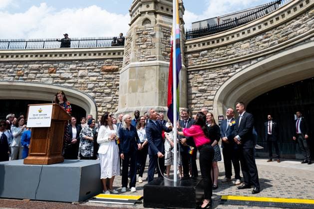 June 10, 2025, Ottawa, On, Canada: Prime Minister Mark Carney, centre-left, takes part in a flag raising ceremony with Minister of Women and Gender Equality and Secretary of State Small Business and Tourism Rechie Valdez marking Pride Month on Parliament Hill in Ottawa, on Tuesday, June 10, 2025. Ottawa Canada  - ZUMAc35_ 20250610_zaf_c35_050 Copyright: xSpencerxColbyx