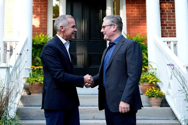 June 14, 2025, Ottawa, On, CANADA: Prime Minister Mark Carney greets Prime Minister of the United Kingdom Keir Starmer, outside his residence at Rideau Cottage in Ottawa, for a visit before the G7 Summit in Kananaskis, Alta., on Saturday, June 14, 2025. Ottawa CANADA  - ZUMAc35_ 20250614_zaf_c35_210 Copyright: xJustinxTangx