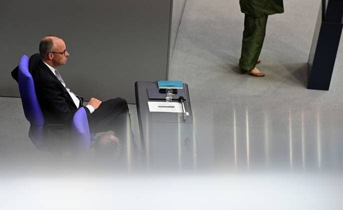 Federal Chancellor Friedrich Merz CDU and parts of his cabinet sit on the government bench, whilec, Co-Chairman of the Greens parliamentary group, responds to the government statement by the Federal Chancellor, Federal Chancellor Friedrich Merz CDU
