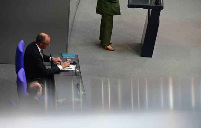 Federal Chancellor Friedrich Merz CDU and parts of his cabinet sit on the government bench, whilec, Co-Chairman of the Greens parliamentary group, responds to the government statement by the Federal Chancellor, Federal Chancellor Friedrich Merz CDU