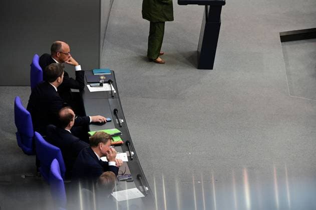 Federal Chancellor Friedrich Merz CDU and parts of his cabinet sit on the government bench, whilec, Co-Chairman of the Greens parliamentary group, responds to the government statement by the Federal Chancellor, Federal Chancellor Friedrich Merz CDU