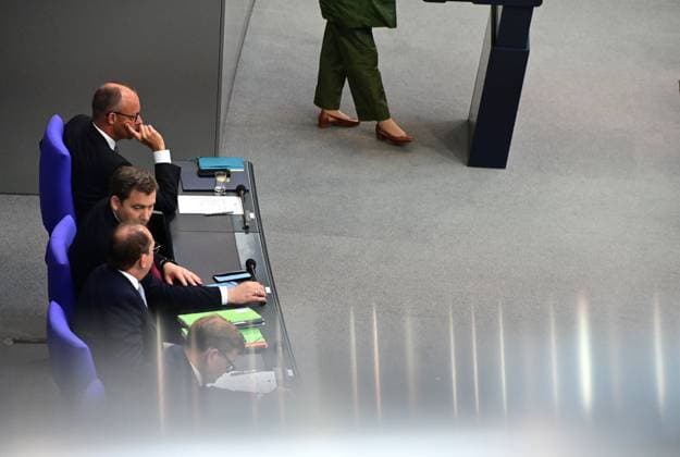 Federal Chancellor Friedrich Merz CDU and parts of his cabinet sit on the government bench, whilec, Co-Chairman of the Greens parliamentary group, responds to the government statement by the Federal Chancellor, Federal Chancellor Friedrich Merz CDU