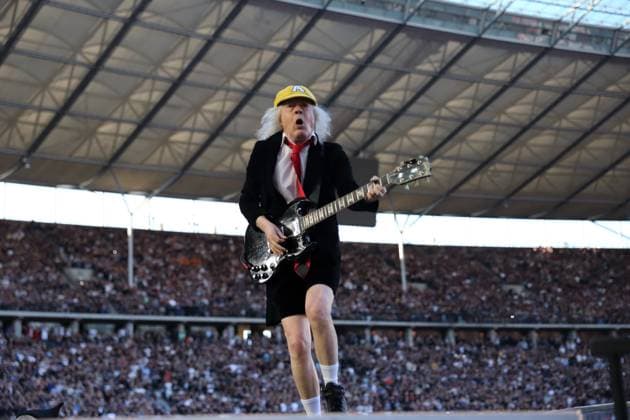 Angus Young from the band AC DC at a concert in the Olympiastadion in Berlin, June 30, 2025 AC DC concert Berlin