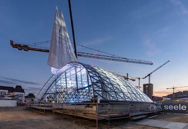 First entrance portal at the new Stuttgart main station completed For the first time, one of four so-called lattice shells can be seen, through which travelers will enter the underground through station in the future The spectacular steel and glass construction was executed by façade specialist Seele and planned by christoph ingenhoven