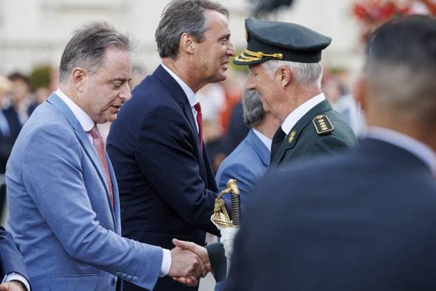 Prime Minister Bart De Wever and King Philippe - Filip of Belgium pictured during the military and civilian parade on the Belgian National Day, in Brussels, Monday 21 July 2025. This parade pays tribute to our country s security and emergency services, such as the army, police, fire brigade or civil protection. POOL NICOLASxMAETERLINCK 129720422