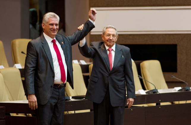 Miguel Diaz Canel, Raul Castros successor as President of Cuba, was elected by deputies by 603 votes out of 604 April 19, 2018 Newly elected Cuban President Miguel Diaz Canel L reacts as former Cuban President Raul Castro raises his hand during the National Assembly in Havana, Cuba, April 19, 2018 Havana Cuba  Copyright: xACNxviaxBestimagexACNxviaxBestimagex