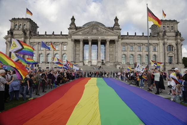 Germany, Berlin, Demonstration in front of the Bundestag, Rainbow flag in front of the Bundestag