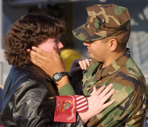 Operation Enduring Freedom Dec 01, 2001; San Diego, CA, USA; Cpl. FRANK ZEPEDA wipes tears from his wife AMANDA s cheek before the USS BONHOMME RICHARD leaves San Diego Naval Station. The 13th Marine Expeditionary Unit on board the Bonhomme Richard, along with the USS Odgen & USS Pearl Harbor, head for the Arabian Sea to support military operations.. Copyright: xAndrewxSilkx