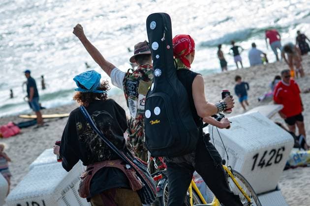 The punks enter the beach of Westerland with the loudly proclaimed battle cry Alerta, Alerta Antifascista Punks on the beach of Westerland on the North Sea island of Sylt, Sylt Schleswig Holstein Germany Westerland
