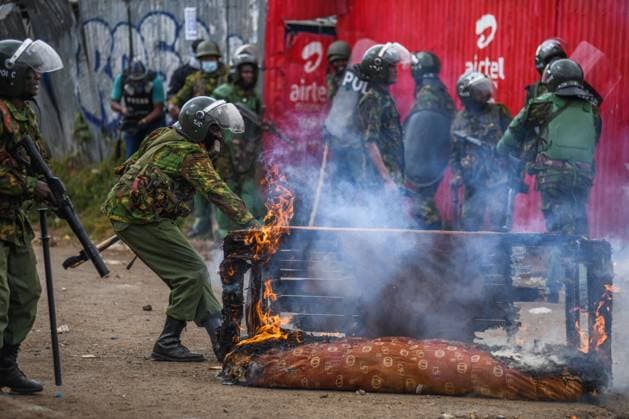 Demonstration against high cost of living in Kenyan capital Nairobi NAIROBI, KENYA - JULY 19: Police try to extinguish a sofa on fire during demonstration held against the rising cost of living, in Nairobi, Kenya on July 19, 2023. Police used tear gas against the demonstrators. Nayrobi Kenya. Editorial use only. Please get in touch for any other usage. Copyright: x2025xAnadoluxGeraldxAndersonx