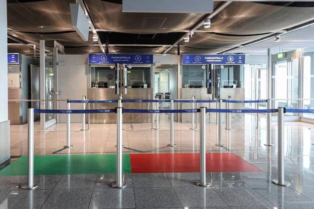 Border Control At Dusseldorf Airport Border Control and passport control signs and post in the terminal building after the gates at Dusseldorf International Airport. Signs showing the Border Control with an illustration of a border police officer, European flag with the stars, All Passports and the EU, EWR, CH symbols and text in German and English before a border control used for out of the EU or Schengen Zone departures and arrivals. Düsseldorf Airport, Germany on August 2025 Dusseldorf Germany  Copyright: xNicolasxEconomoux originalFilename: economou-notitle250830_npKqJ.jpg