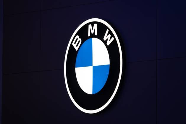 Munich, Bavaria, Germany - September 9, 2025: The iconic BMW logo at the IAA Mobility: The white and blue roundel is illuminated with modern LED lighting at the BMW Group s stand at the IAA Mobility 2025 trade fair in Munich.