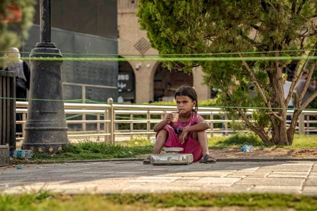 World Day Against Child Labour in Erbil Iraq A girl sits on the ground beside a weighing scale on the World Day Against Child Labour in Erbil, Iraq, on June 12, 2025. The annual observance of the World Day Against Child Labour aims to raise global awareness and advocate for stronger protections for vulnerable children. The ongoing presence of child labour in Erbil underscores the urgent need for long-term social and economic solutions. Erbil Erbil Iraq Copyright: xOmarxKarimx