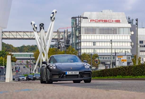 Porscheplatz, Stuttgart Zuffenhausen with Porsche headquarters Artwork Inspiration 911 by Gerry Judah Three steles, each up to 24 meters high, each presenting a Porsche 911 Car transporter with new cars 29 09 2025 Stuttgart, Baden Württemberg, Germany