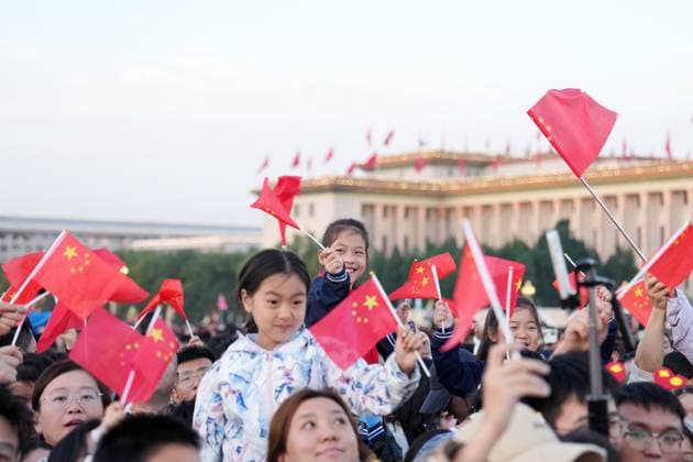(251001) -- BEIJING, Oct. 1, 2025 -- People attend a flag-raising ceremony marking the 76th anniversary of the founding of the People s Republic of China at Tian anmen Square in Beijing, capital of China, Oct. 1, 2025. ) CHINA-BEIJING-NATIONAL DAY-FLAG-RAISING CEREMONY (CN) JuxHuanzong