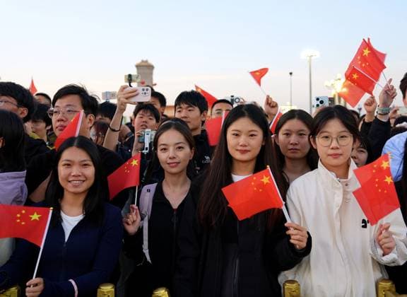 (251001) -- BEIJING, Oct. 1, 2025 -- People attend a flag-raising ceremony marking the 76th anniversary of the founding of the People s Republic of China at Tian anmen Square in Beijing, capital of China, Oct. 1, 2025. ) CHINA-BEIJING-NATIONAL DAY-FLAG-RAISING CEREMONY (CN) XingxGuangli