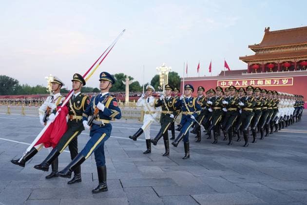 251001 -- BEIJING, Oct. 1, 2025 -- A flag-raising ceremony marking the 76th anniversary of the founding of the People s Republic of China is held at Tian anmen Square in Beijing, capital of China, Oct. 1, 2025. CHINA-BEIJING-NATIONAL DAY-FLAG-RAISING CEREMONY CN JuxHuanzong  CHINA-BEIJING-NATIONAL DAY-FLAG-RAISING CEREMONY (CN) IMAGO JuxHuanzong  imago images 1067188891