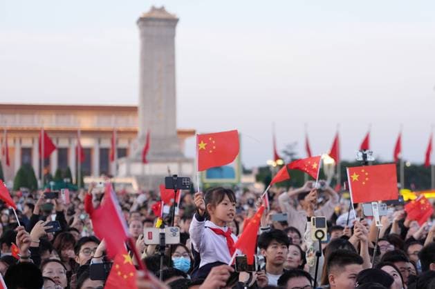 251001 -- BEIJING, Oct. 1, 2025 -- People attend a flag-raising ceremony marking the 76th anniversary of the founding of the People s Republic of China at Tian anmen Square in Beijing, capital of China, Oct. 1, 2025. CHINA-BEIJING-NATIONAL DAY-FLAG-RAISING CEREMONY CN JuxHuanzong CHINA-BEIJING-NATIONAL DAY-FLAG-RAISING CEREMONY (CN) IMAGO JuxHuanzong imago images 1067189665