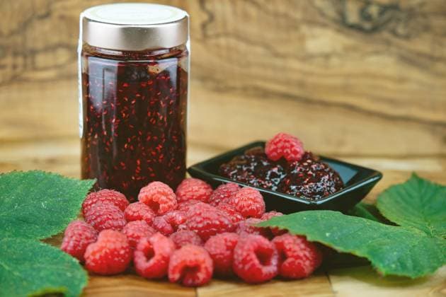 Raspberry Rubus idaeus , Raspberries and Homemade Himbeermarmelade in the Bowl and at Glass European Red raspberry Rubus idaeus , raspberries and selfmade raspberry Jam BLWS735111 Copyright: xblickwinkel Steidix