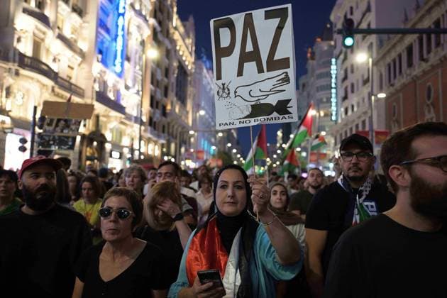 October 4, 2025, Madrid, Madrid, Spain: Protesters hold banners and Palestinian banners during a demonstration in solidarity with the Palestinians in the Gaza strip, in Madrid. Madrid Spain - ZUMA- Oc 20251004_zsp_d308_012 Copyright: xJuanxCarlosxLucasx