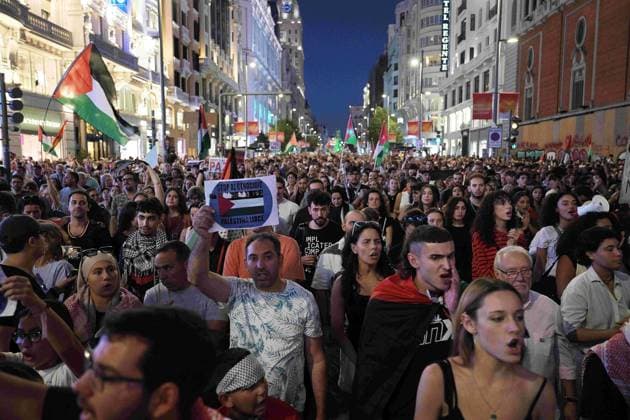 October 4, 2025, Madrid, Madrid, Spain: Protesters hold banners and Palestinian banners during a demonstration in solidarity with the Palestinians in the Gaza strip, in Madrid. Madrid Spain - ZUMA- Oc 20251004_zsp_d308_013 Copyright: xJuanxCarlosxLucasx